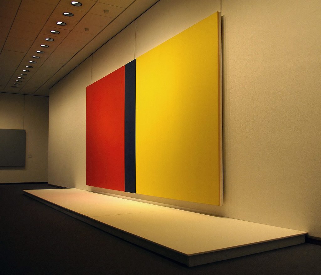 Who's afraid of red, blue and yellow, Barnett Newman. IMage of painting hanging in Neue National Gallery in Berlin