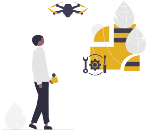 A person controlling a drone over a farming area.