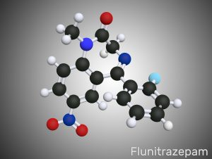 The ball and stick model of the drug called 'Flunitrazepam'. Ball represent the atoms and sticks represent the bonds between atoms.